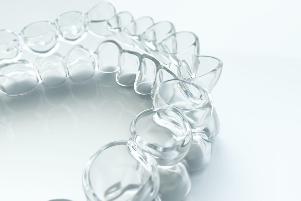 clear aligners on a white background
