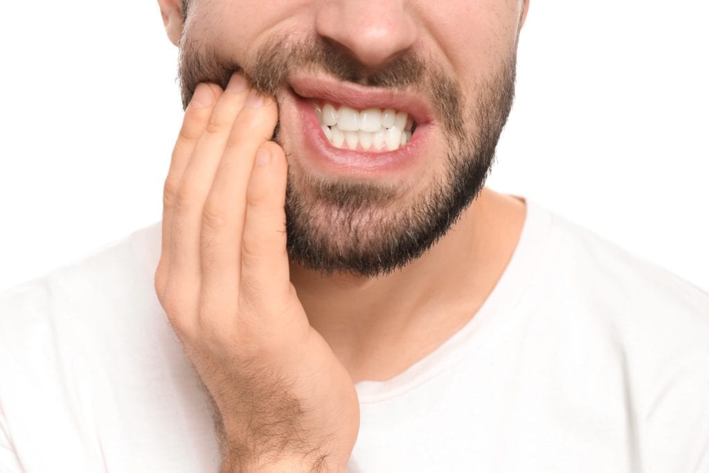 man with toothache