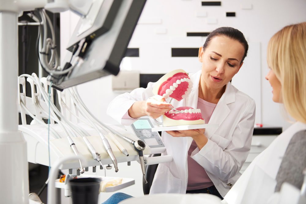 dentist talking to patient